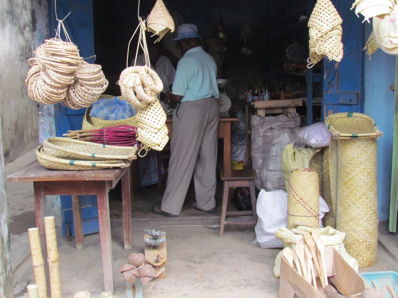 Woven palmyra-leaf baskets and mats for sale at a shop in a Jaffna market.